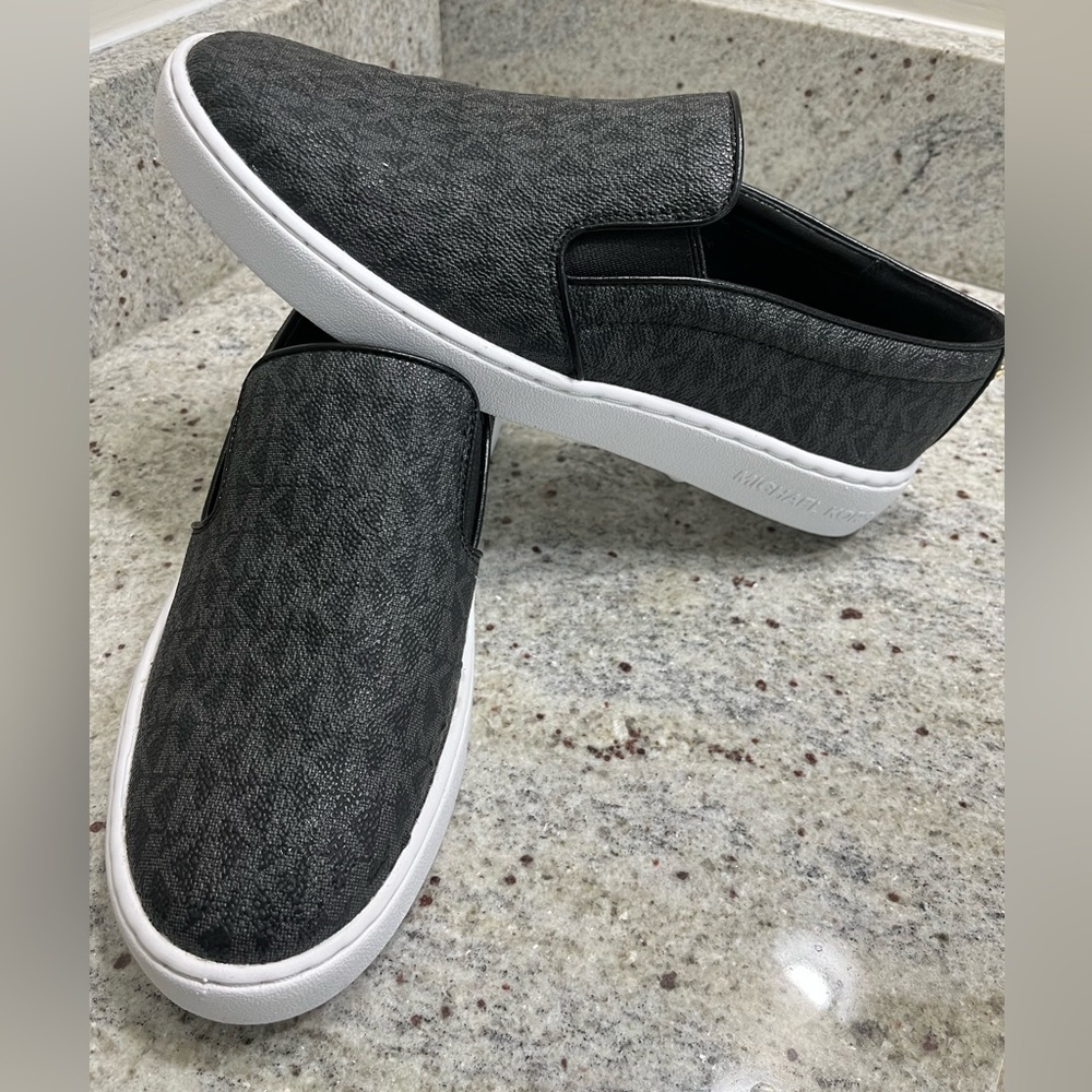 Michael Kors "Keaton" slip-on flats/sneakers. Women's size 7.5 US, brand new.
